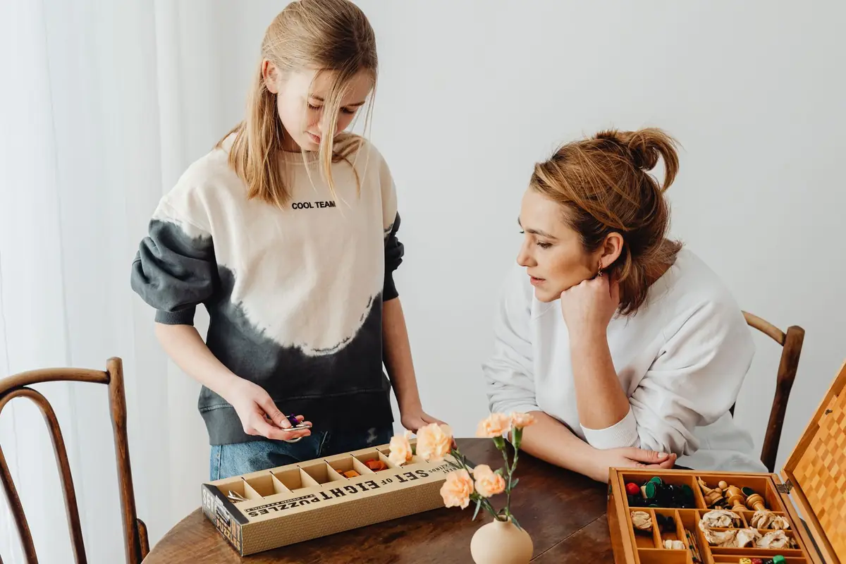 Friends working through a puzzle together